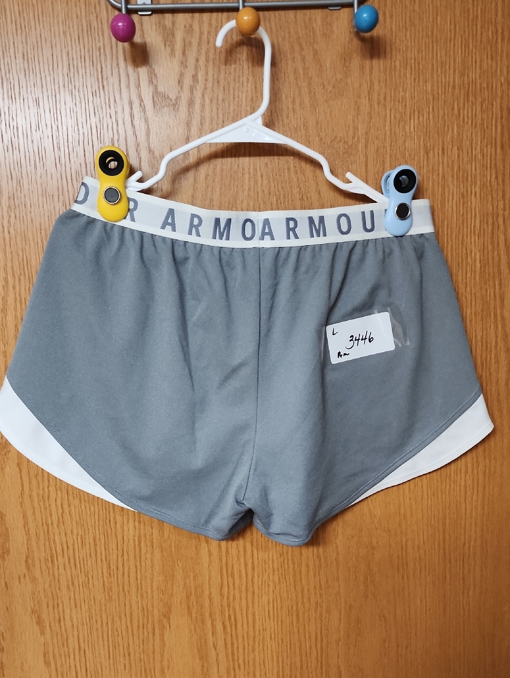 Under Armour Grey Athletic Shorts womens L number 3446 with pockets...